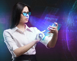 The concept of business, technology, the Internet and the network. A young entrepreneur working on a virtual screen of the future and sees the inscription: Benefits