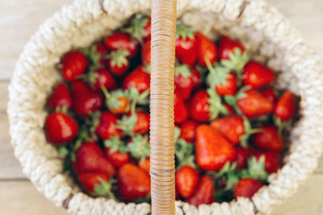 strawberry in a basket, seasonal berries, close-up, focus
