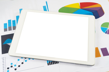 Blank white screen tablet on business graph