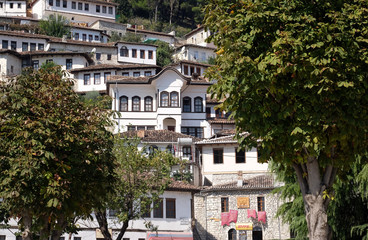 Fototapeta na wymiar Traditional ottoman houses in old town Berat known as the White City of Albania 
