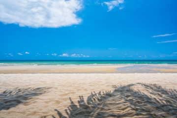 Sand beach and blue sky background