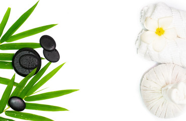 Towel with zen stones over white background