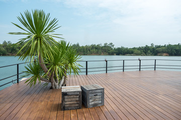 Wooden floor with lake view for outdoor activities or celebration