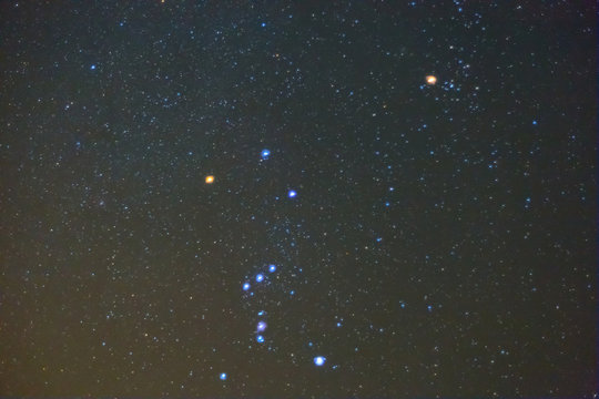 closeup Orion constellation on a night sky background