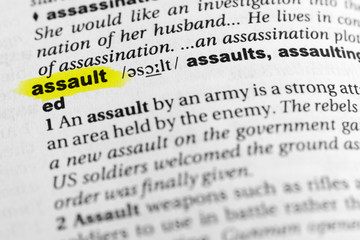 Highlighted English word "assault" and its definition in the dictionary
