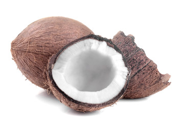 Whole coconut and half coconut on a white background isolated