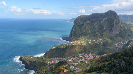 Eagle rock (Penha de Águia) and Faial small parish. Madeira Island, Portugal. Year 2018.