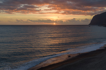 Obraz premium Praia Formosa beach sunset. Madeira island, Portugal. 19.3.2018