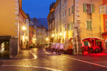 Fototapeta na wymiar Nice street Rue Sainte-Claire in Old Town of Annecy at rainy night, France