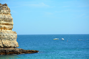 Fototapeta na wymiar Beach view of calm and blue sea
