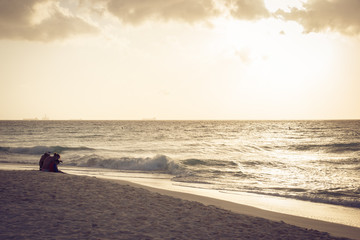 Idyllic caribbean beach at sunset
