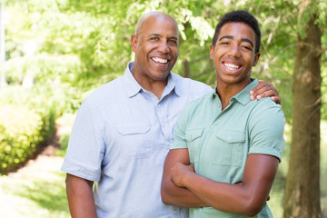 African American father and teen son.