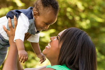 Happy African American mother and son.