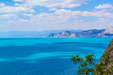 Sea and Mountains landscape at Cape Meganom, the east coast of the peninsula of Crimea. Beautiful nature, Colorful background.