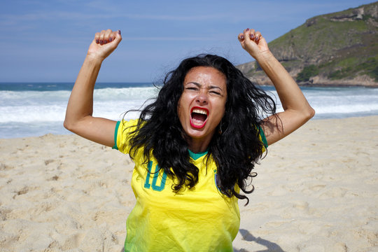 Woman celebrating goal in soccer Brazil