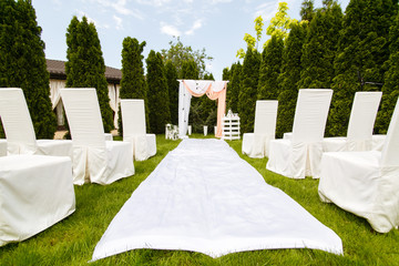 Wedding arch outdoors. Beautiful wedding set up.