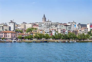 Istanbul, Turkey, 12 June 2007: The Galata Tower and ships in the Karakoy district of Istanbul.