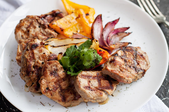 Grilled pork sirloin with vegetables