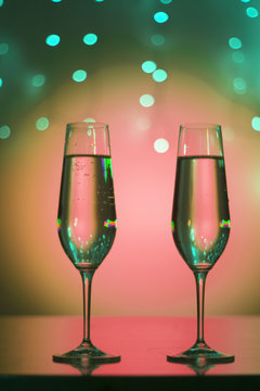 Champagne glasses in disco party bar