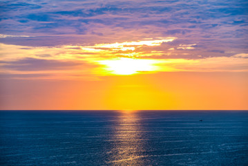 panorama view of blue sea with sunset