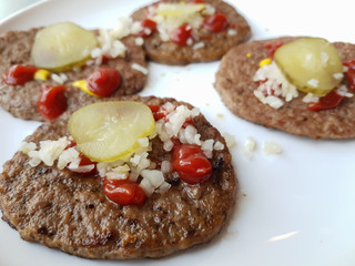 Beef hamburger steak served on plate