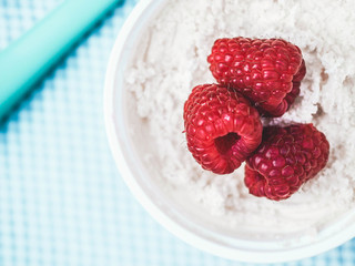White cream with raspberries