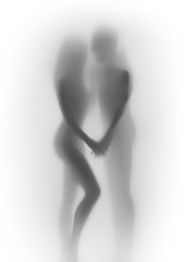 Beautiful lover couple body silhouette together, behind a diffuse surface
