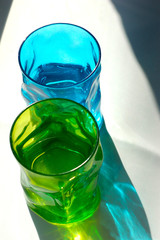 Two glasses of colored glass. Refreshing drink.