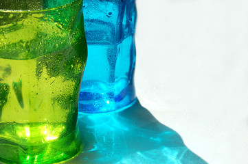 Two glasses of colored glass. Refreshing drink.