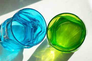 Two glasses of colored glass. Refreshing drink.