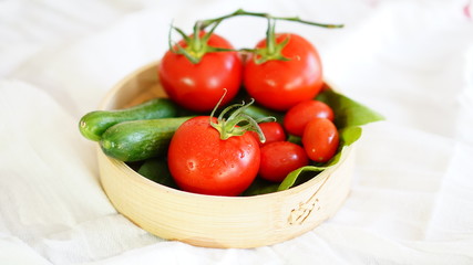 fresh organic vegetable. Tomatoes, cherry tomatoes, cucumber with white background
