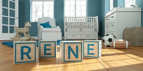 Naklejka premium The name rene written with wooden toy cubes in children's room