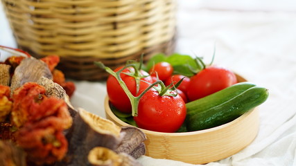 fresh organic vegetable. Tomatoes, cherry tomatoes, cucumber with white background