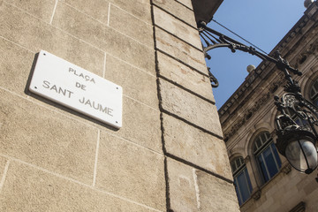 Fototapeta premium Detail of street sign of Sant Jaume Square in Barcelona, Spain.