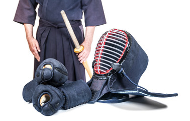 sportsman and protective equipment 'bogu' and bamboo sword 'sinai'  for Japanese fencing Kendo...