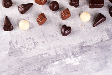 Border pattern of photos assortment of chocolate candies