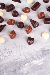 Border pattern of photos assortment of chocolate candies