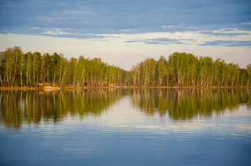 beautiful, picturesque nature. The lake is surrounded by forest.