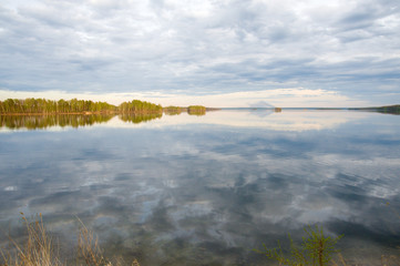 beautiful, picturesque nature. The lake is surrounded by forest.