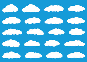 Set of white clouds in flat style on light blue background.