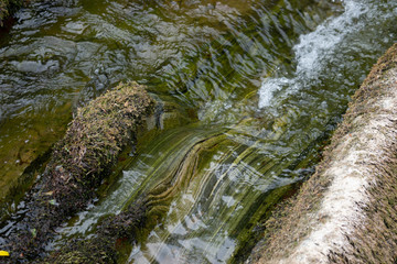 Eroded stones on a river bed.