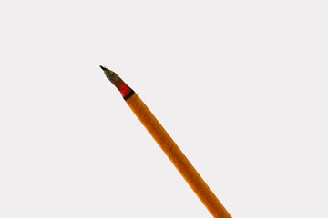 Burning orange incense joss stick in white background