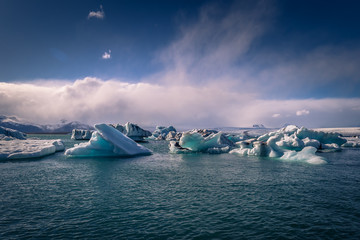 Jokulsarlon - May 05, 2018: Stunning blocks of ice in the Iceberg lagoon of Jokulsarlon, Iceland