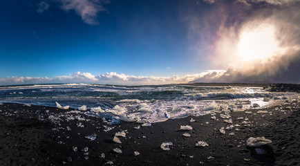Jokulsarlon - May 05, 2018: Ice blocks in Diamond beach near Jokulsarlon, Iceland