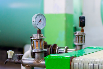Manometer or pressure gauge at industrial factory