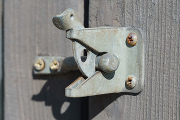 old closed fence latch