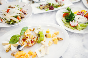 delicious dishes on the table in the restaurant. serving table.