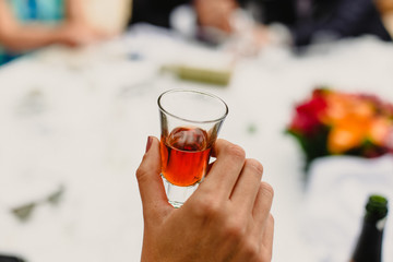 Having a drink at a wedding