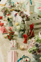 candy bar at a wedding filled with sweets and baubles