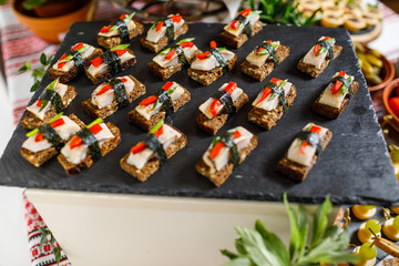 Beautifully decorated catering banquet table with different food